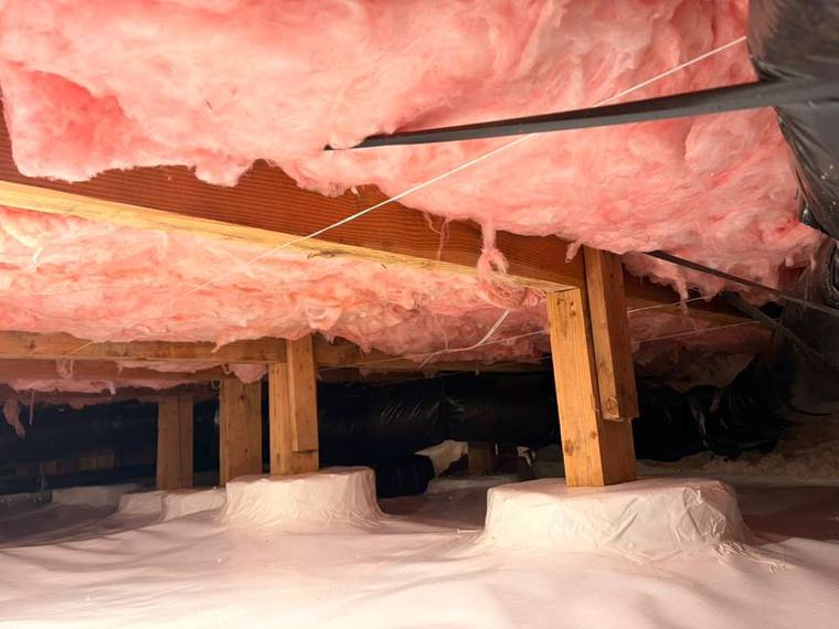 Pink fiberglass insulation in attic, Ridgefield WA home energy solutions