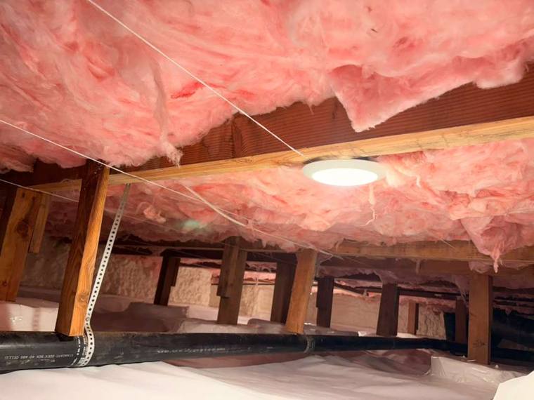 Pink fiberglass insulation in attic, Forest Fresh insulation project.